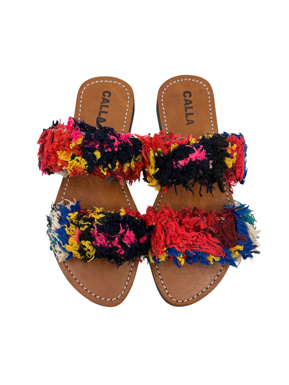 Pair of sandals with colorful fringes made of upcycled rugs
