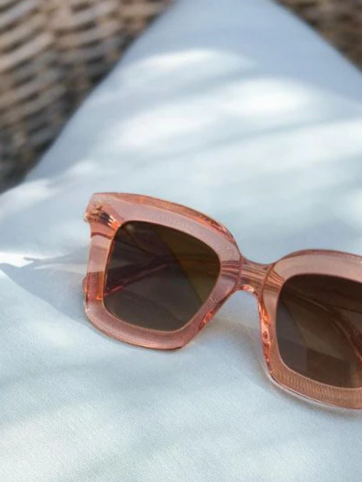 Rose gold sunglasses with gradient lenses