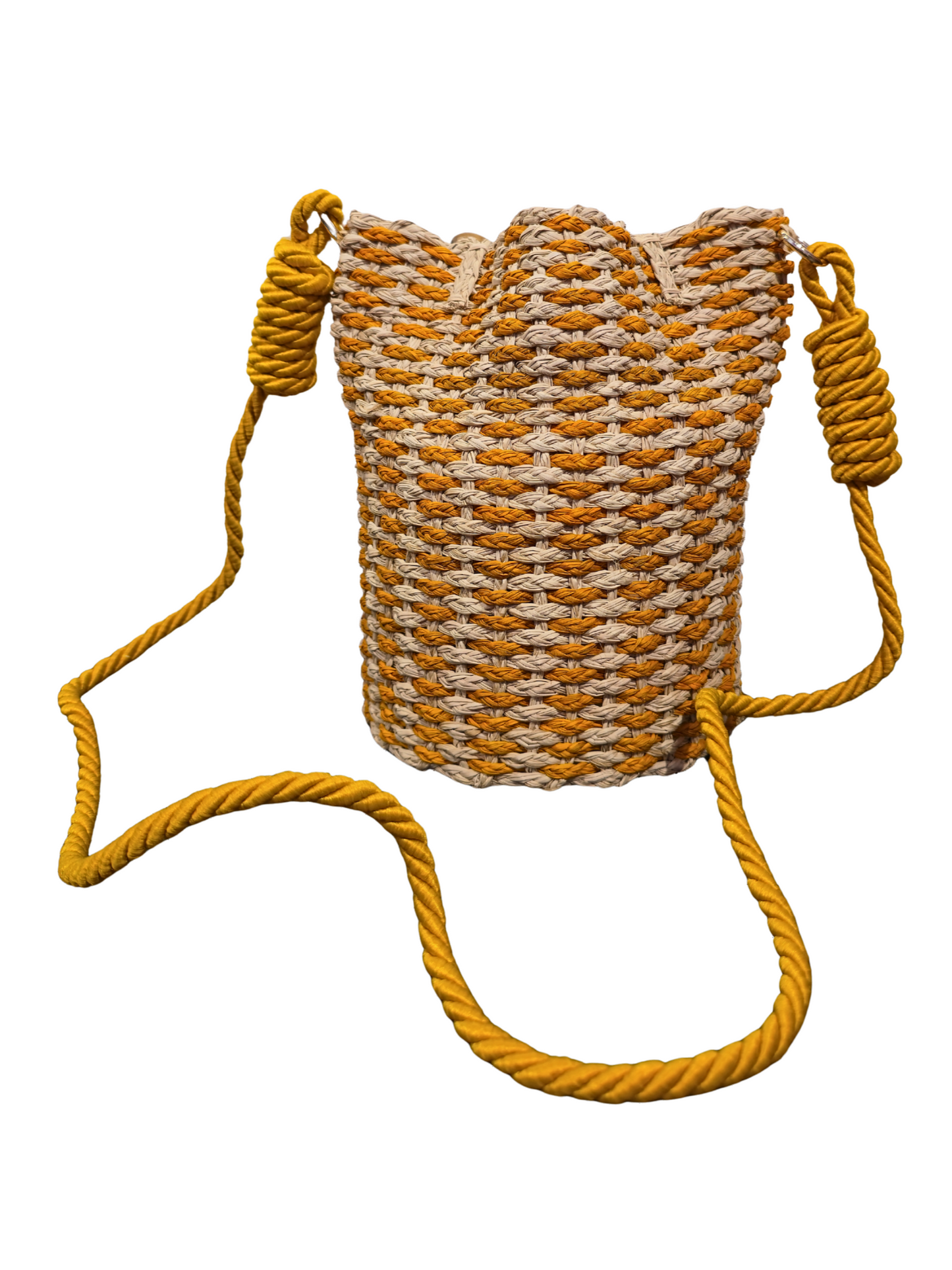 Handwoven iraca bucket bag with sculptural shape and vibrant weave.