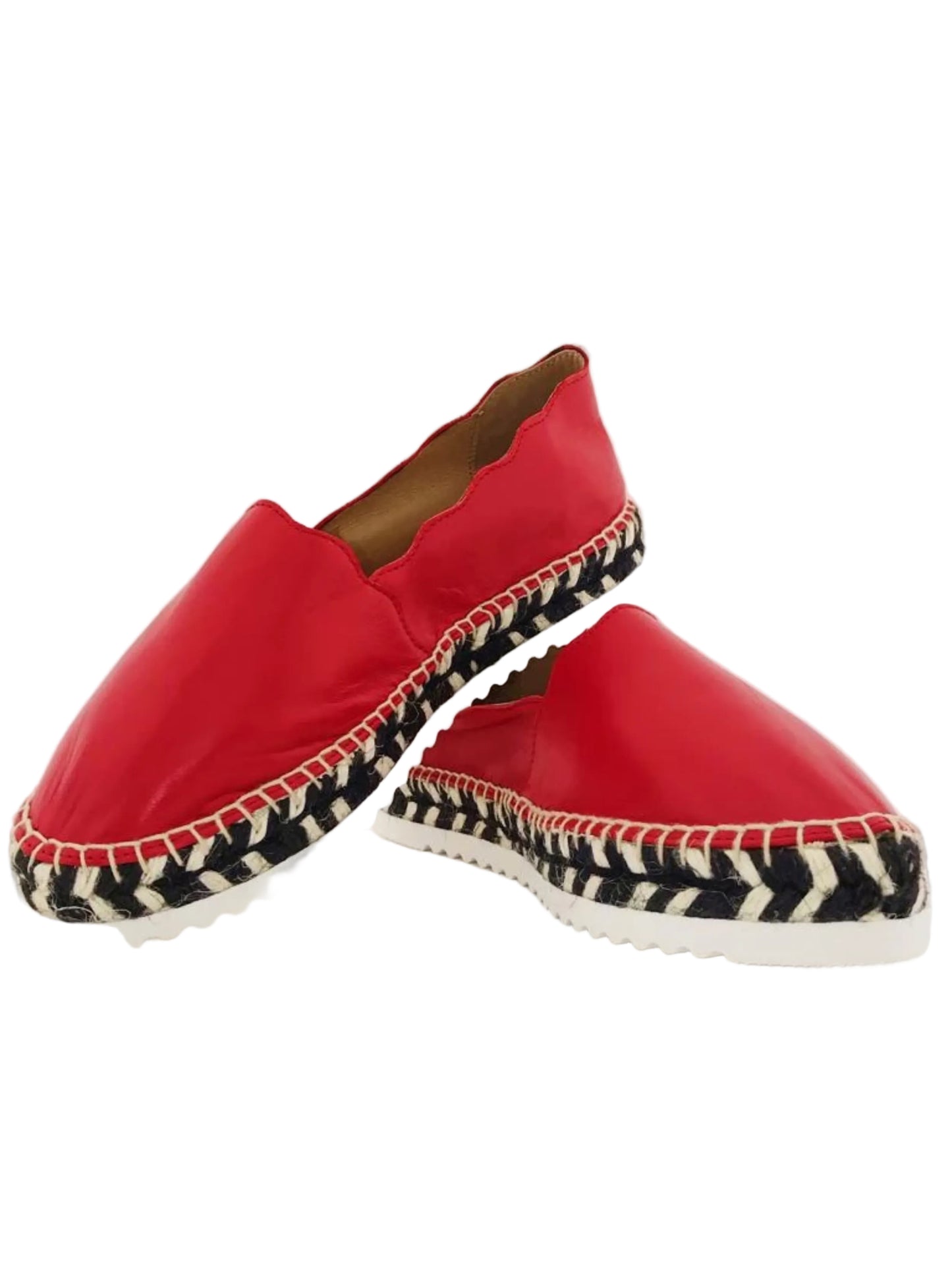 Red slip-on shoe with zebra-patterned sole