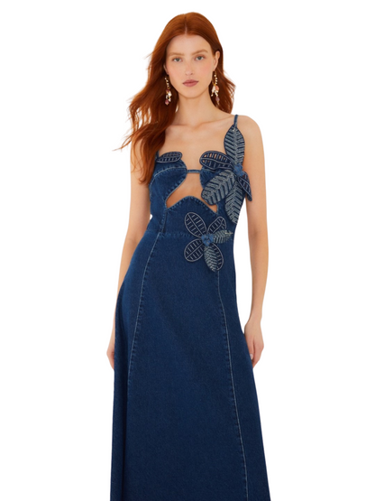  dark blue denim dress with large, 3D floral applique details on the bodice and thin shoulder straps