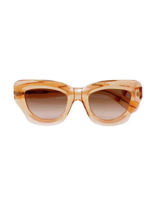 Sunglasses with a apricot frame and gradient lenses
