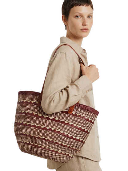 Woven basket with brown and beige pattern