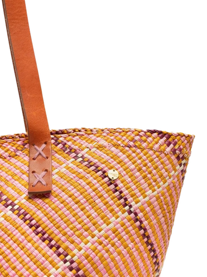woven basket handback in orange pink tones with a leather strap 