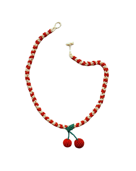 Necklace with red and white beads and cherry pendants 