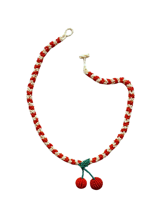 Necklace with red and white beads and cherry pendants