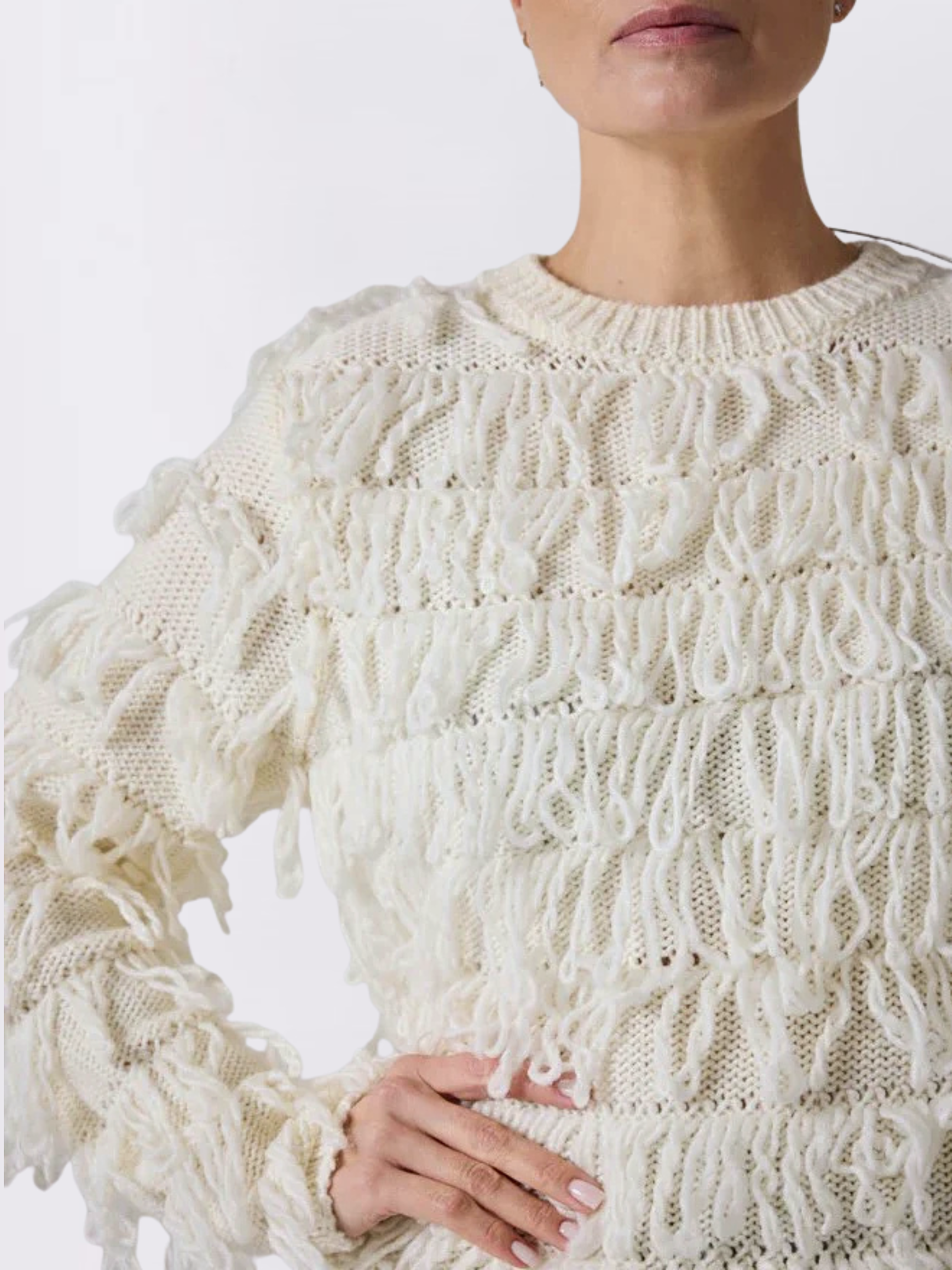 white fringed sweater