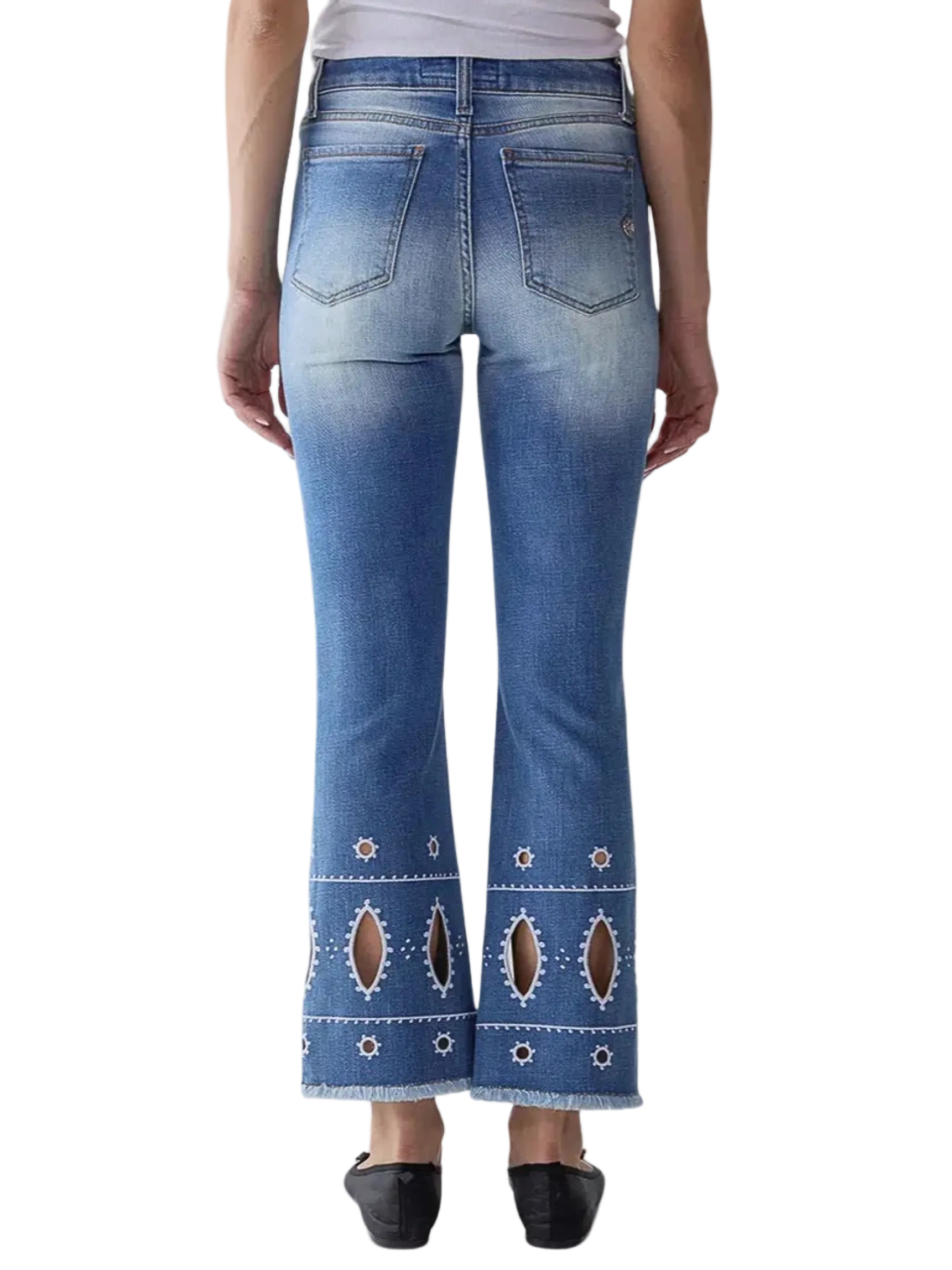 light blue cropped jeans with cutout embroidery details