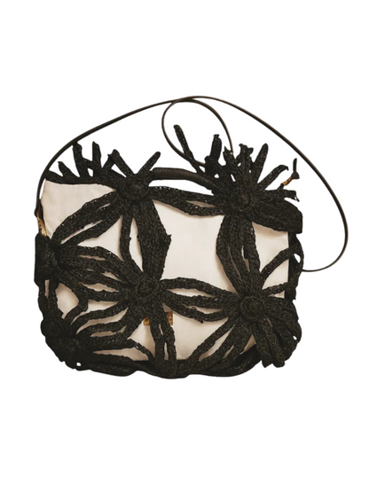 Wicker flower-shaped shoulder bag with sculptural design