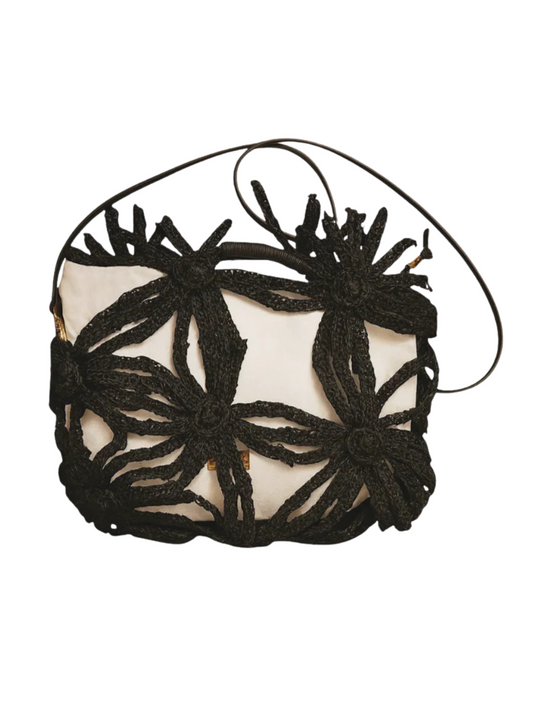 Wicker flower-shaped shoulder bag with sculptural design