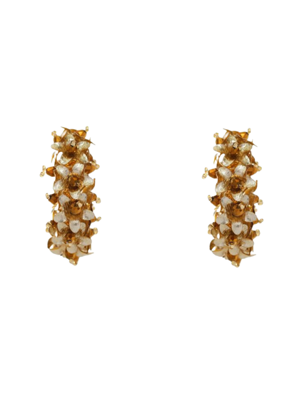 Pair of gold hoop earrings with floral designs