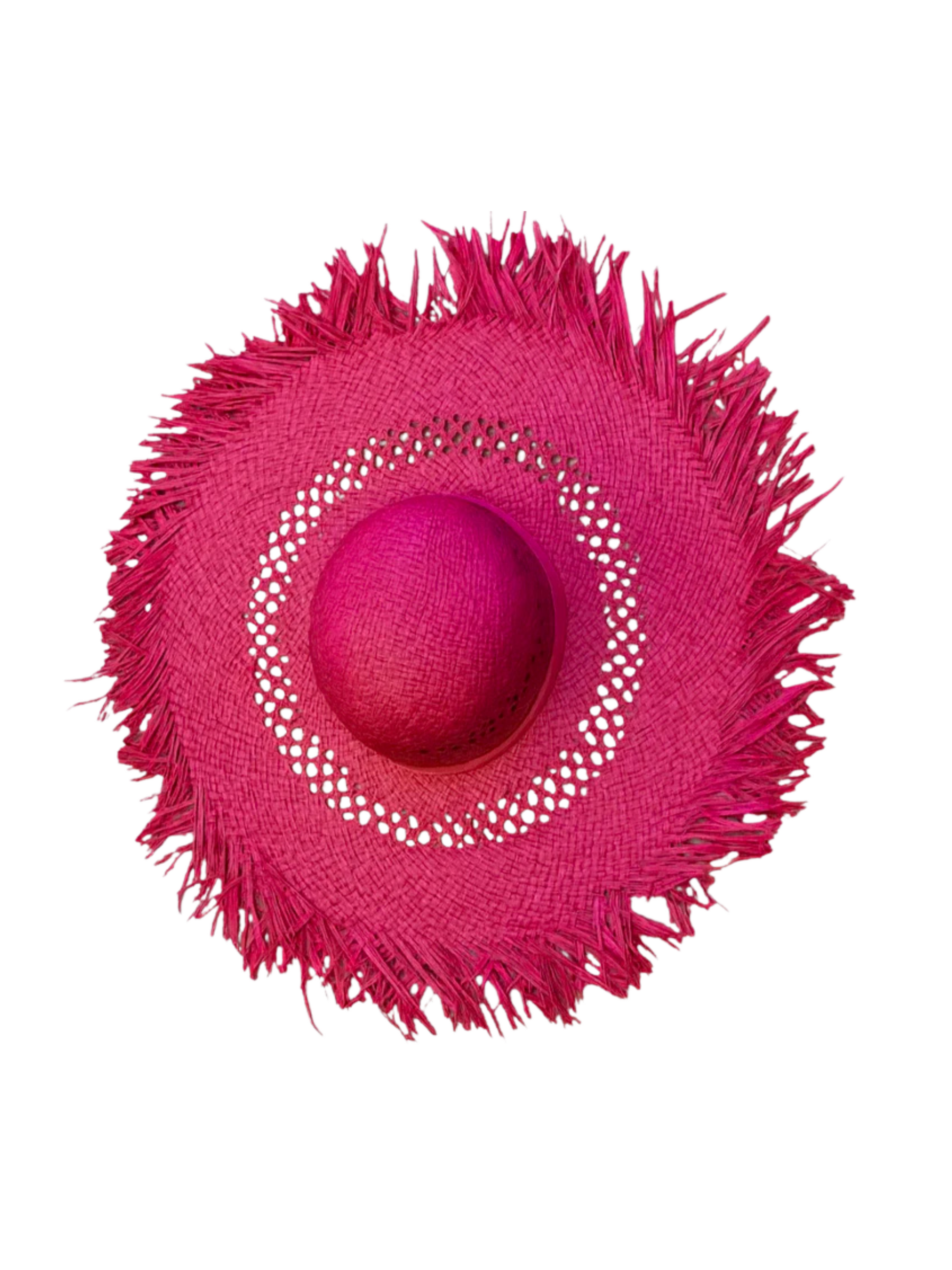 pink straw hat with decorative band 