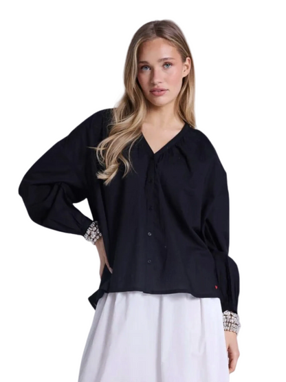 black blouse with long sleeves