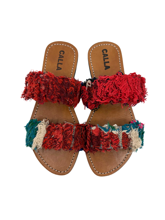 slide sandals featuring textured red and multicolor fringe straps 