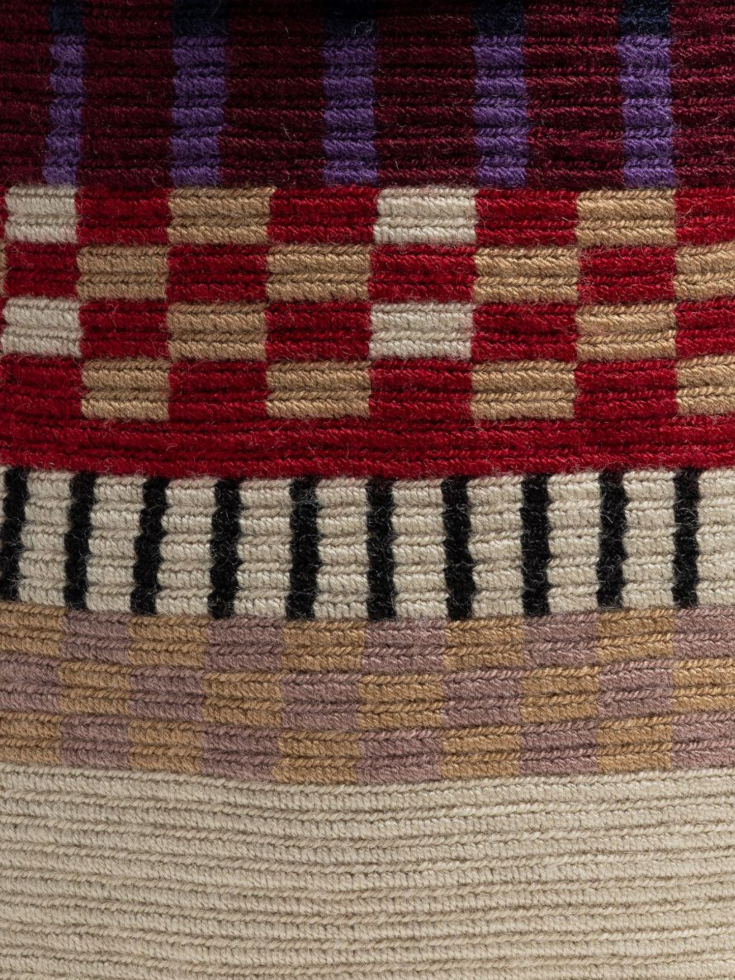 Woven handbag with a braided handle 