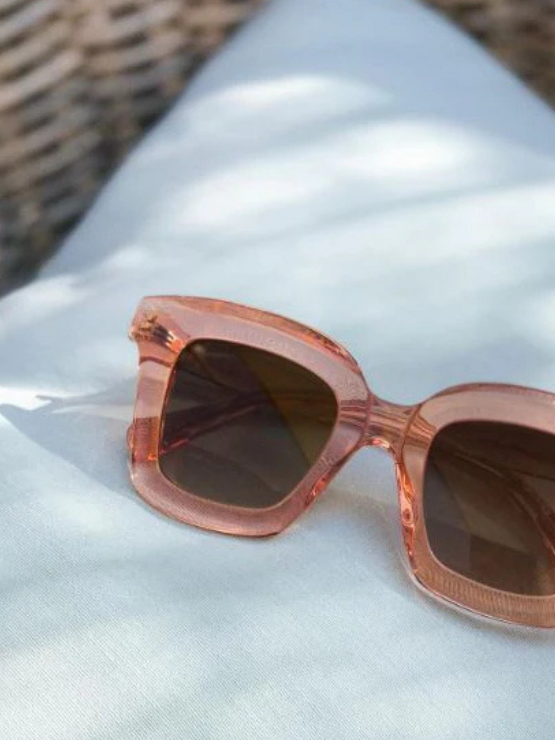 Rose gold sunglasses with gradient lenses