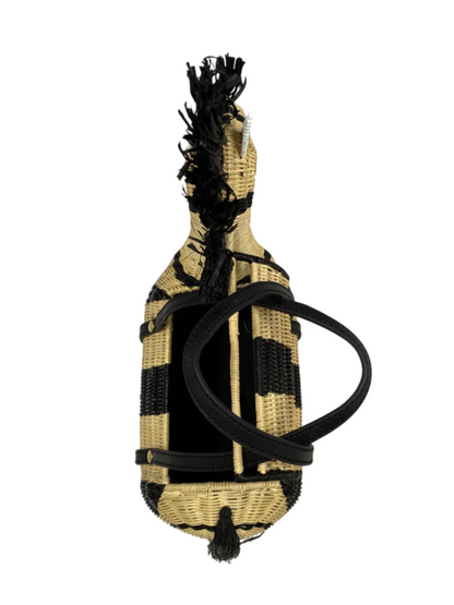 Woven zebra-shaped handbag with black stripes