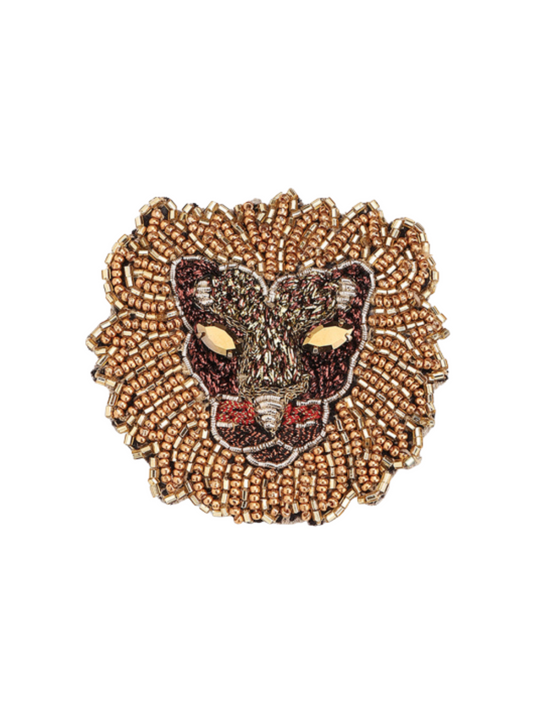 Decorative brooch with a lion's head design