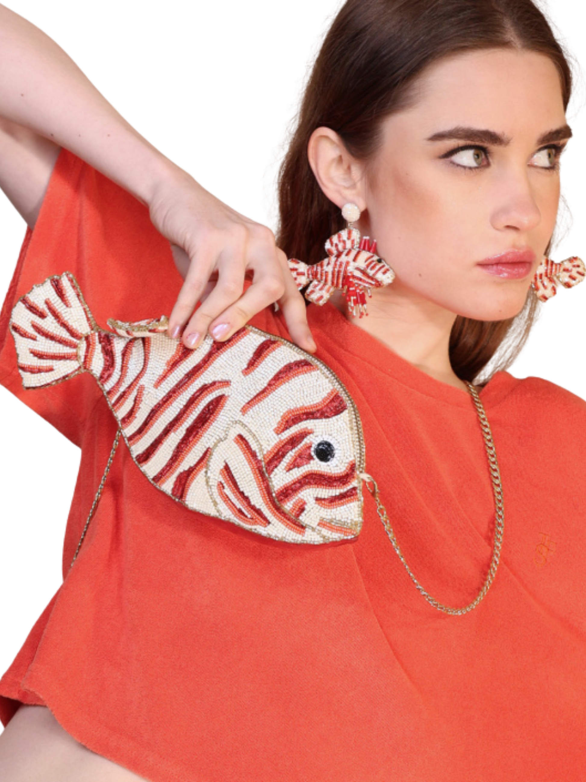 Fish-shaped handbag with red and beige pattern
