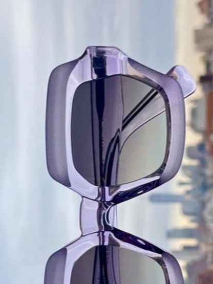 Purple sunglasses with a gradient lens
