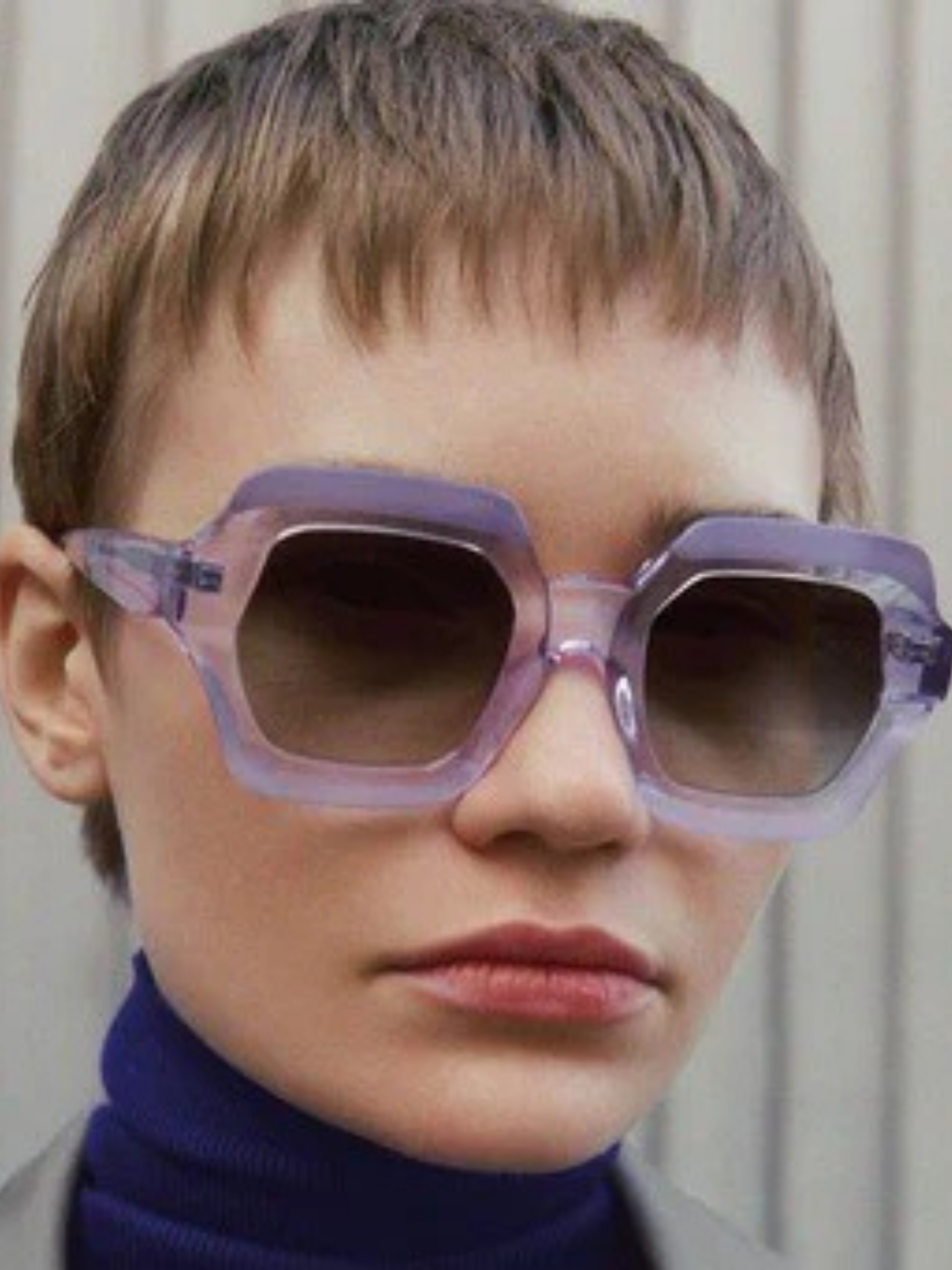 Purple sunglasses with a gradient lens