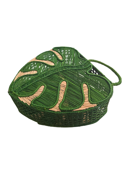 green woven handbag designed to look like a monstera leaf