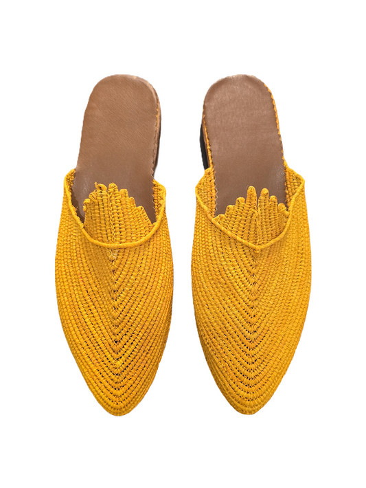 Pair of yellow woven slippers