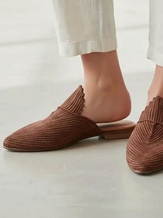 Pair of brown woven slippers 