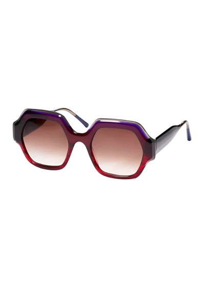 Sunglasses with a red and blue frame 