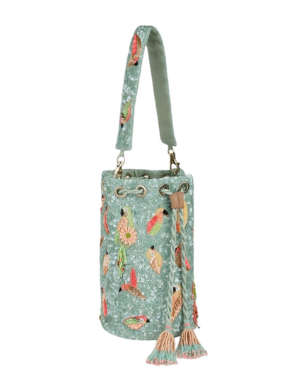 sage blue beaded bag with parrots