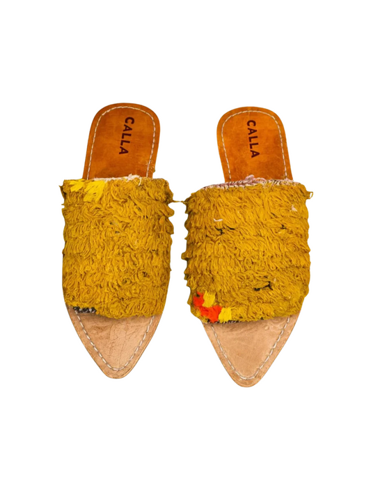 Moroccan babouche slippers crafted from upcycled vintage Berber rugs