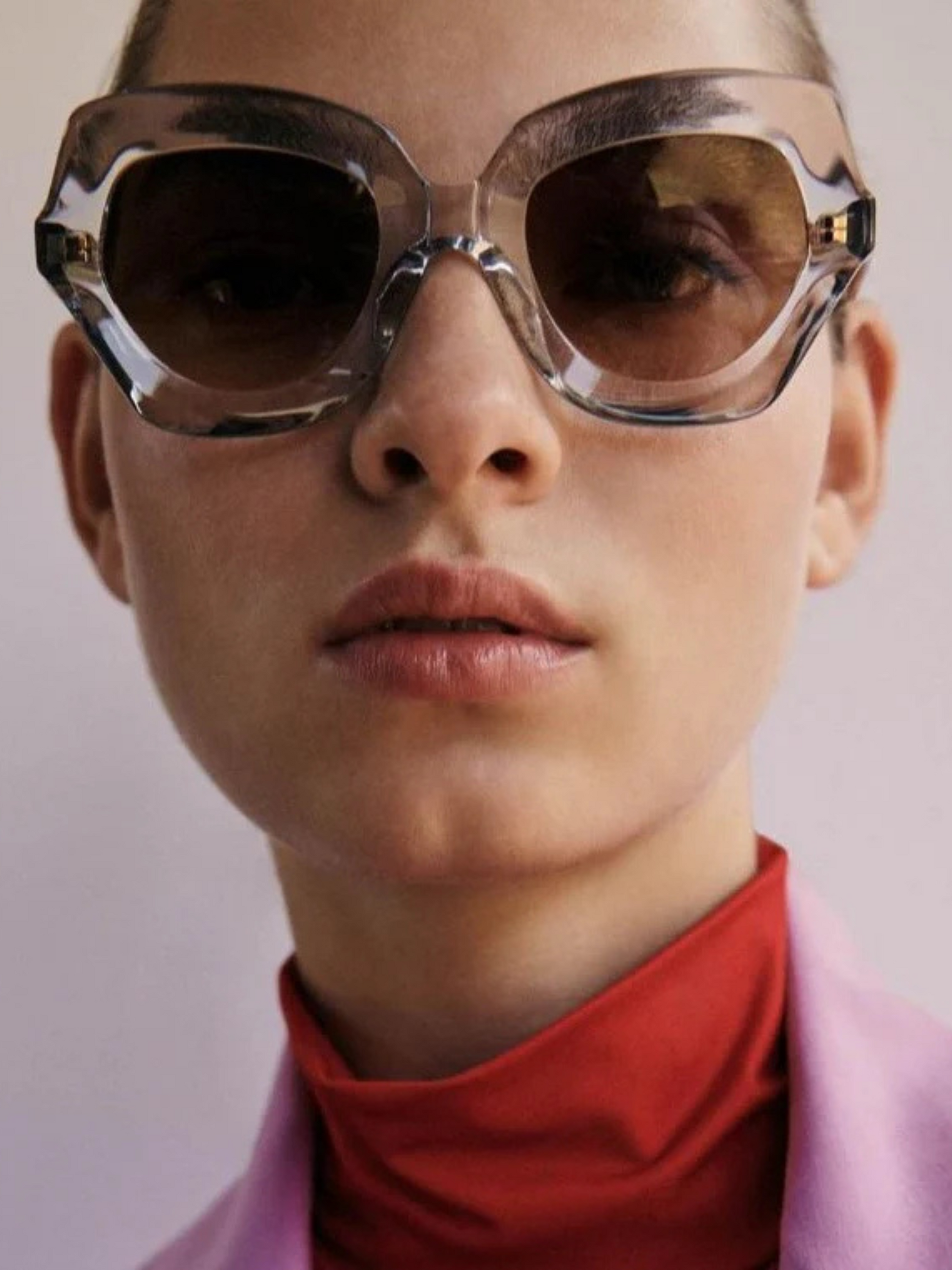 Sunglasses with clear frame and brown gradient lenses 