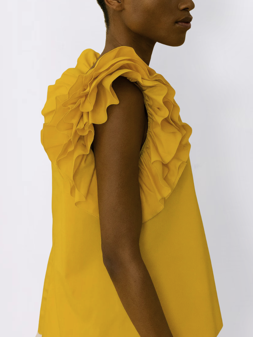Yellow blouse with ruffled sleeves