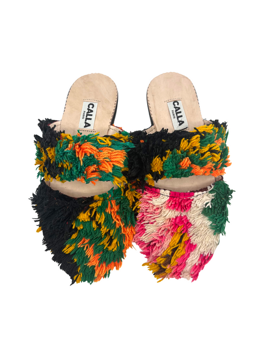 shaggy mule sandals featuring vibrant multicolor fringe in green, orange, pink, yellow