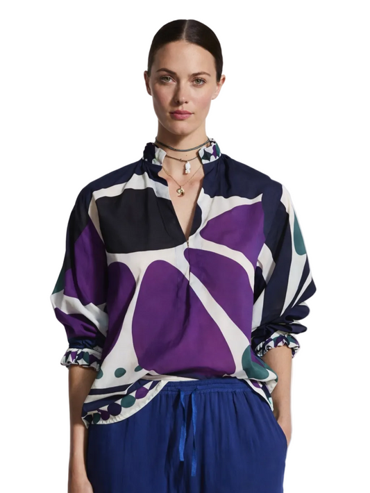 colorful patterned blouse