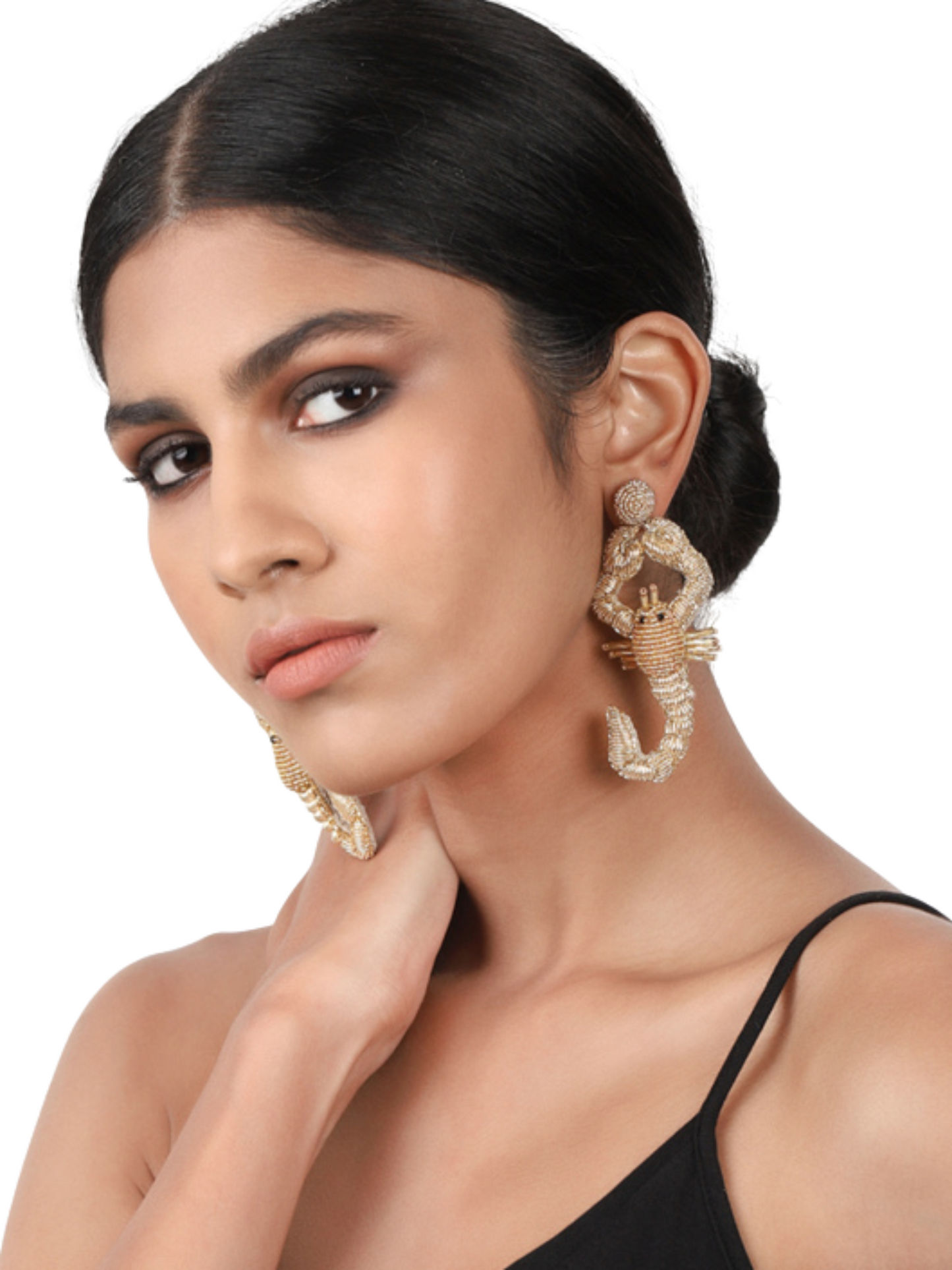 Scorpio-shaped earrings in gold