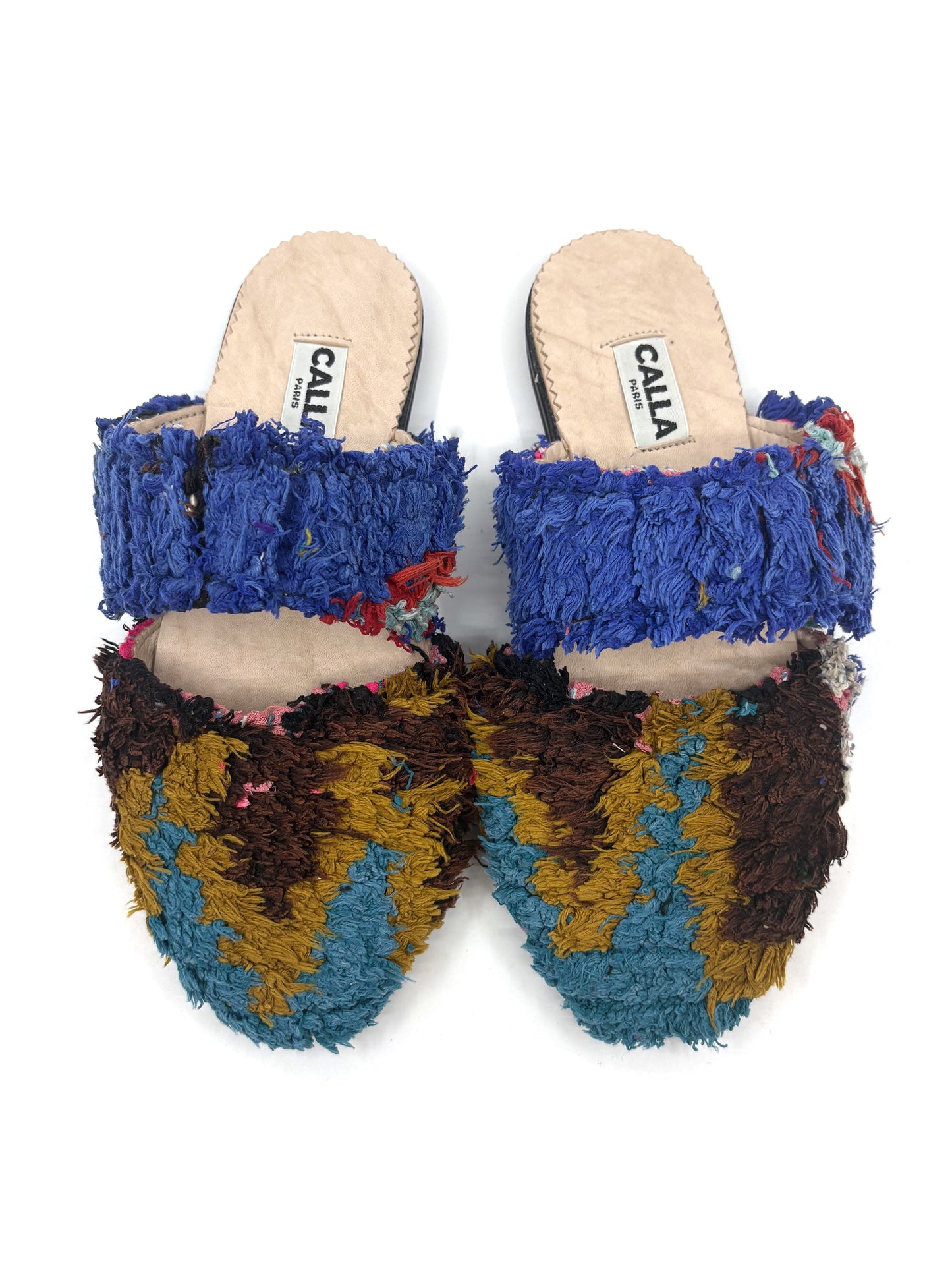 Multicolored slippers with frayed edges