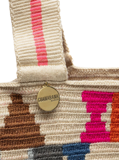 Colorful patterned tote bag with striped handles
