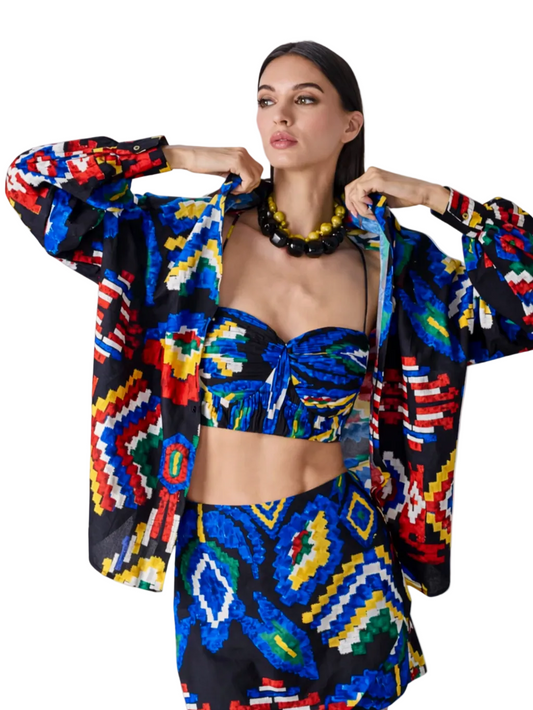colorful outfit with a patterned jacket and skirt