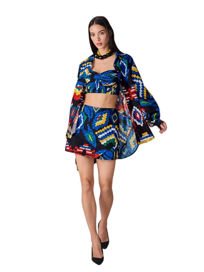 colorful outfit with a patterned jacket and skirt