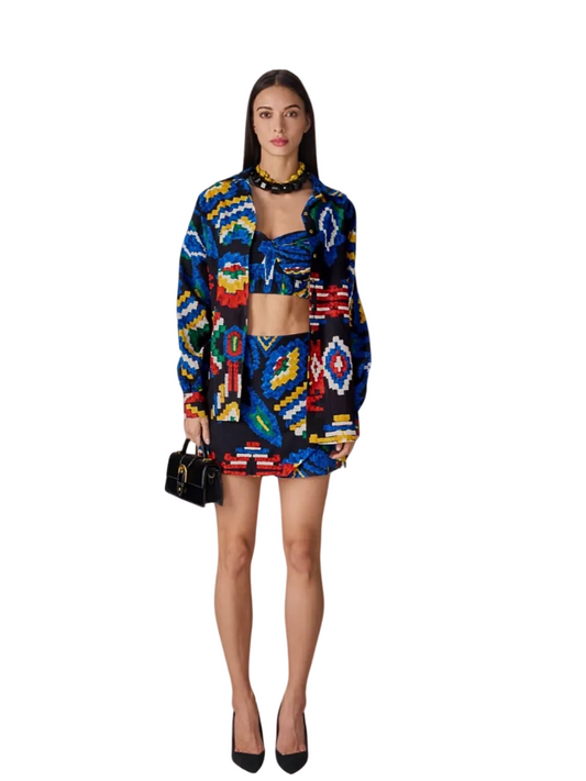 colorful outfit with a patterned jacket and skirt