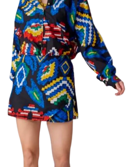 colorful outfit with a patterned top and skirt 