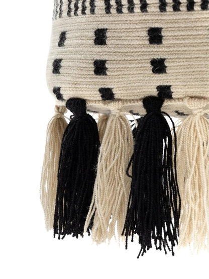 Handbag with black and white pattern and tassels