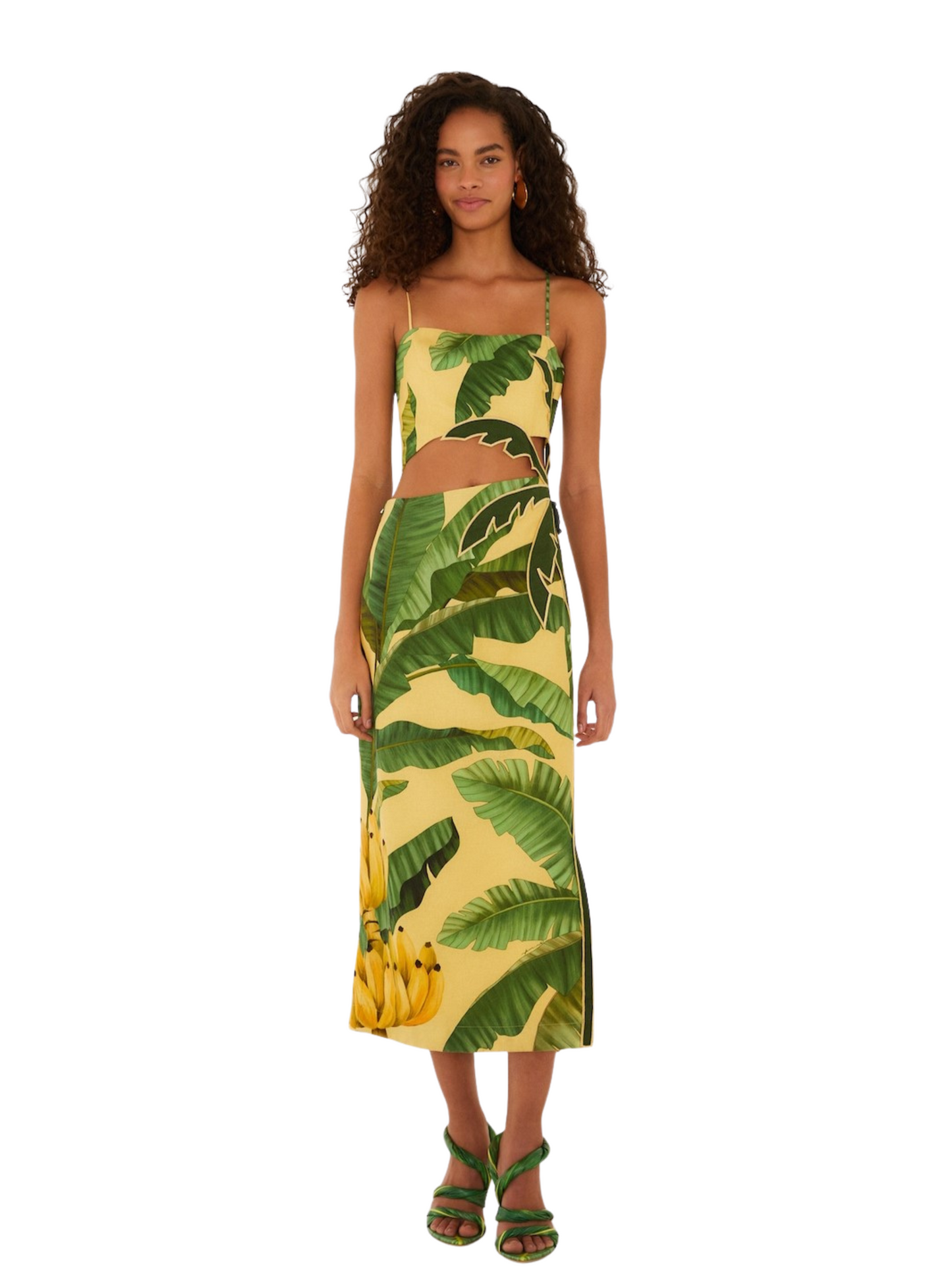  yellow midi dress with a green banana leaf print, featuring spaghetti straps, a side cutout
