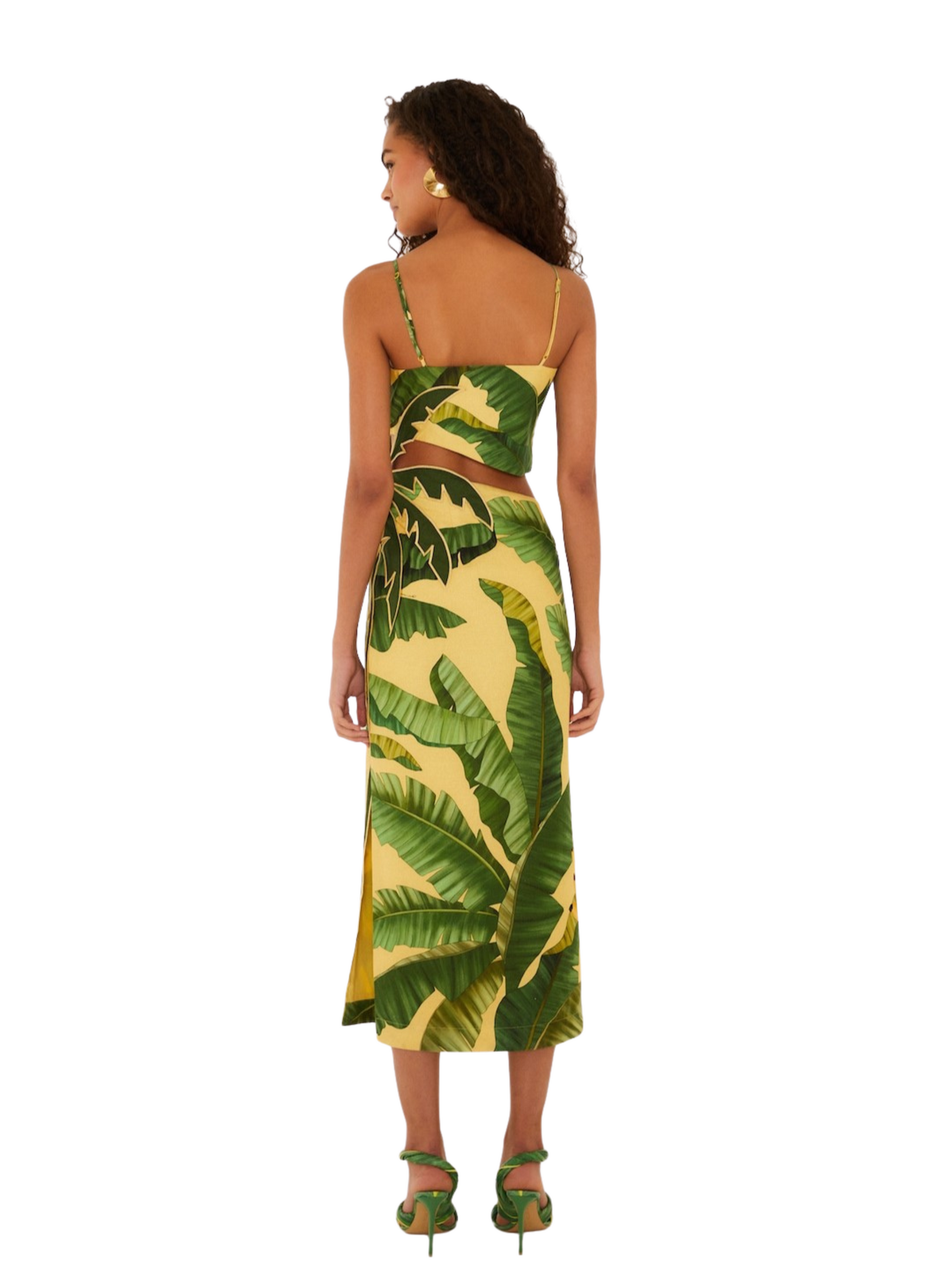  yellow midi dress with a green banana leaf print, featuring spaghetti straps, a side cutout