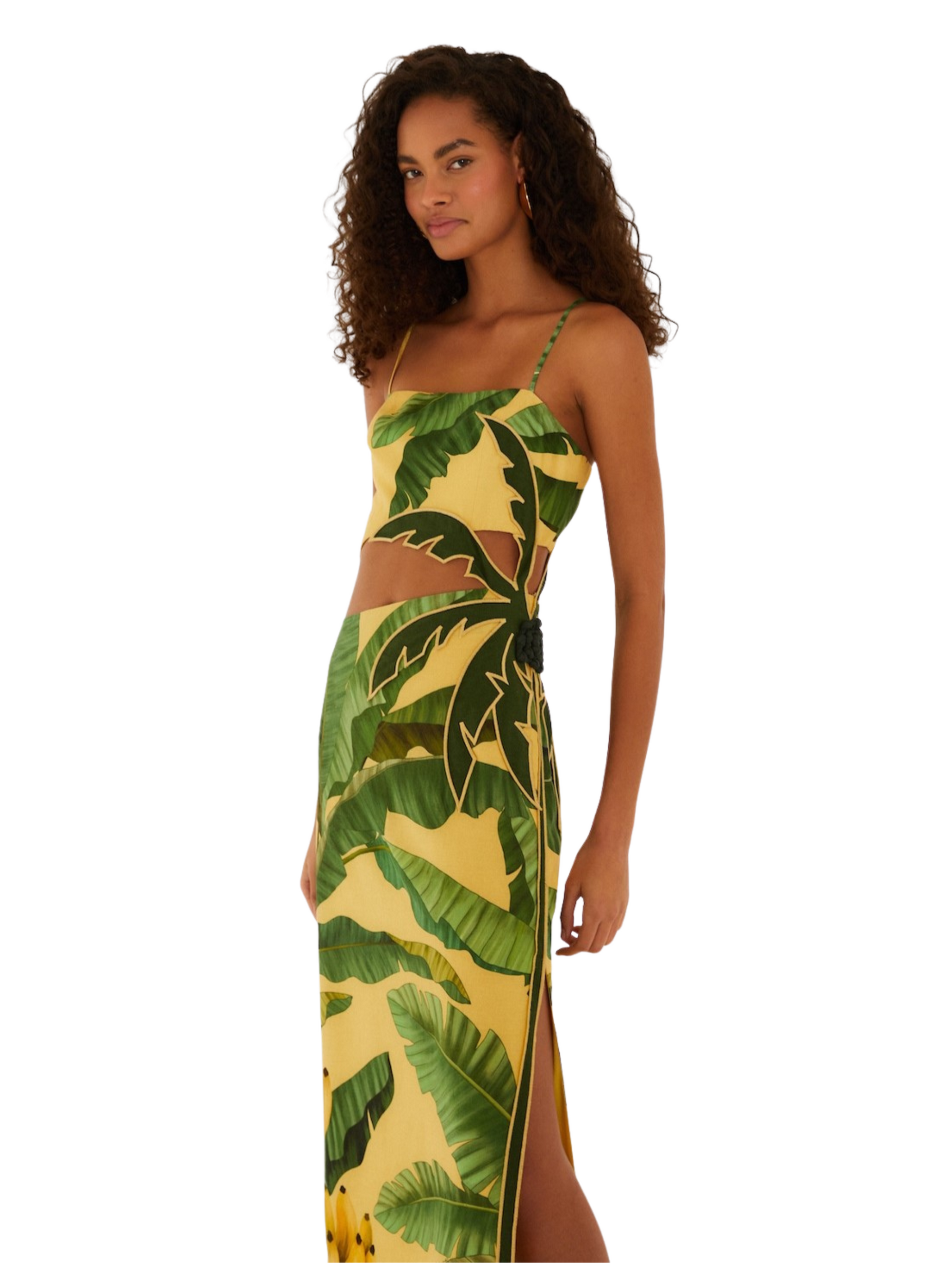  yellow midi dress with a green banana leaf print, featuring spaghetti straps, a side cutout