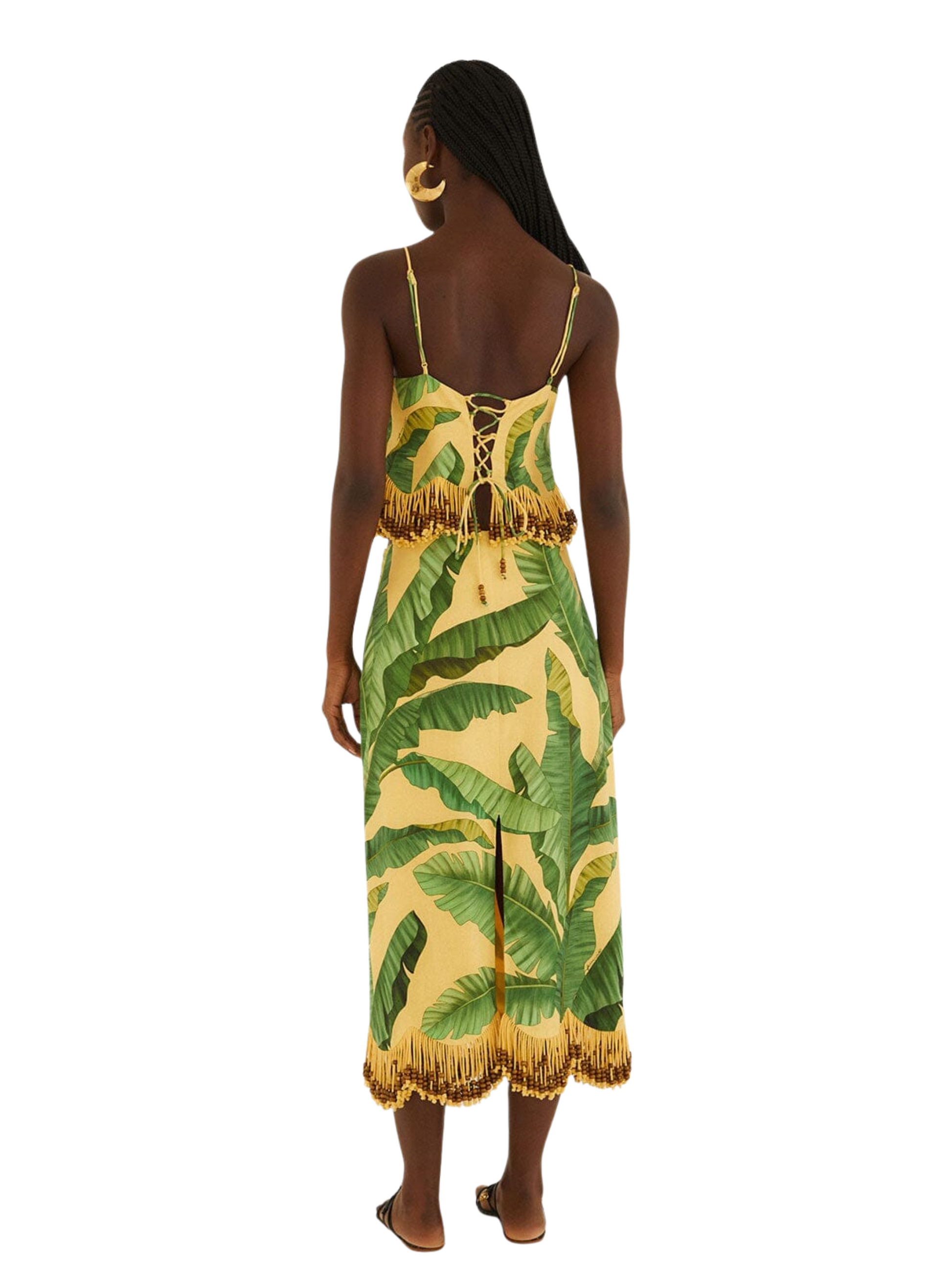 yellow midi skirt with a green banana and palm leaf print, featuring gold fringe 