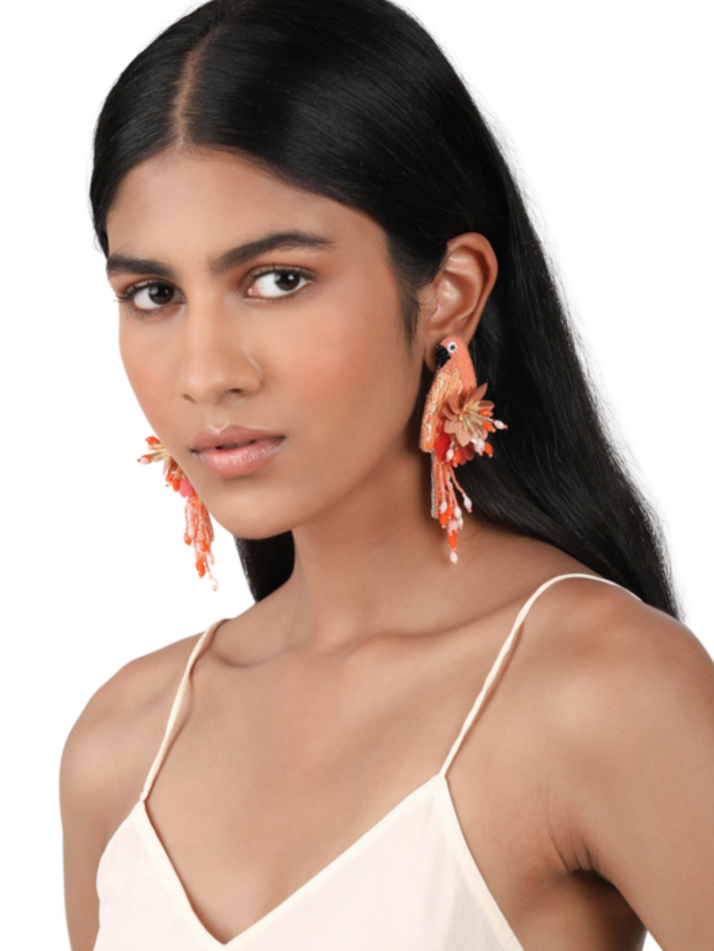 handmade parrot earrings crafted with peach and pink beads