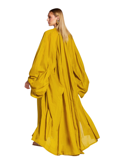 loose-fitting maxi dress in a rich mustard yellow color