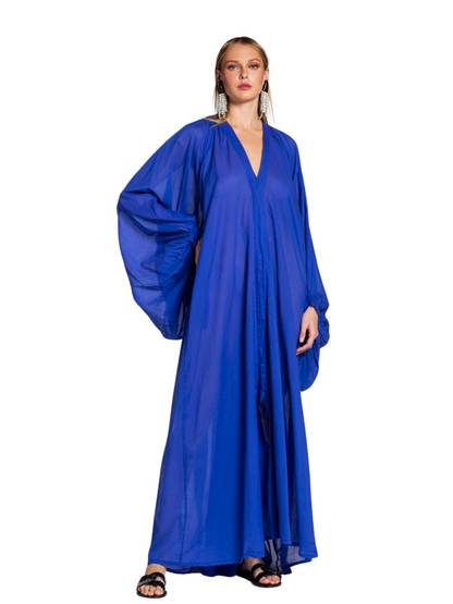 flowing royal blue caftan-style maxi dress with voluminous draped sleeves and a deep V-neckline